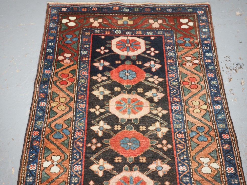 ANTIQUE NARROW RUNNER WITH MINA KHANI DESIGN, HAMADAN REGION, CIRCA 1900. View III