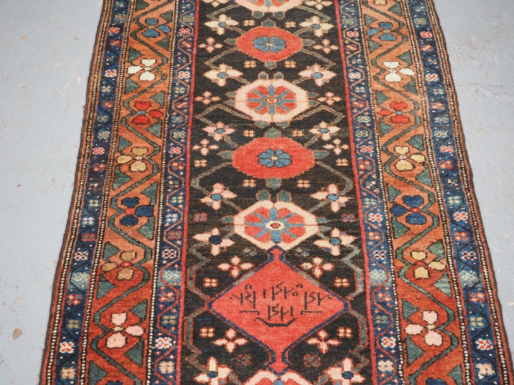 ANTIQUE NARROW RUNNER WITH MINA KHANI DESIGN, HAMADAN REGION, CIRCA 1900. View IV