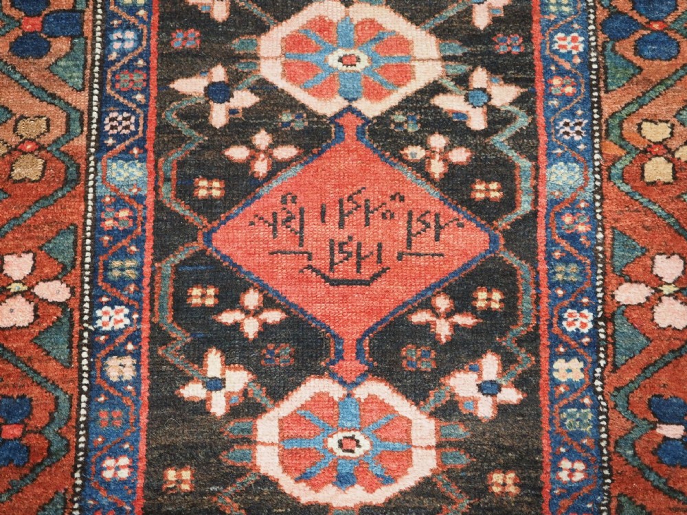 ANTIQUE NARROW RUNNER WITH MINA KHANI DESIGN, HAMADAN REGION, CIRCA 1900. View X