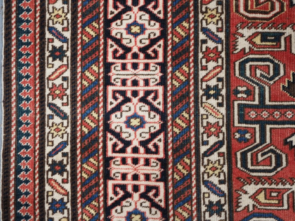 ANTIQUE CAUCASIAN KUBA PEREPEDIL RUG WITH SOFT RED GROUND, CIRCA 1900. View VII