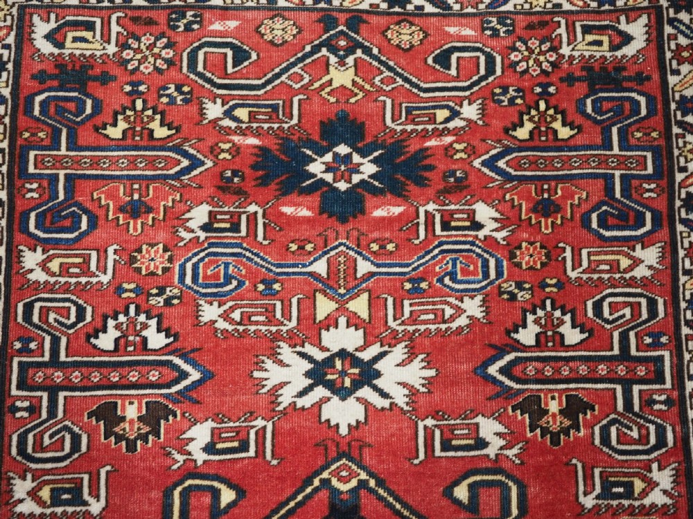 ANTIQUE CAUCASIAN KUBA PEREPEDIL RUG WITH SOFT RED GROUND, CIRCA 1900. View VIII