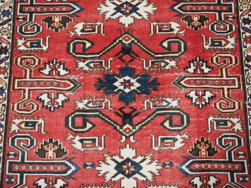 ANTIQUE CAUCASIAN KUBA PEREPEDIL RUG WITH SOFT RED GROUND, CIRCA 1900. View IX