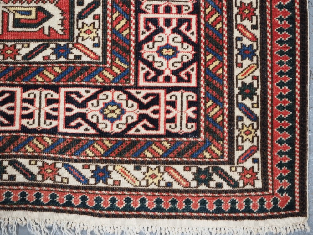 ANTIQUE CAUCASIAN KUBA PEREPEDIL RUG WITH SOFT RED GROUND, CIRCA 1900. View XIII