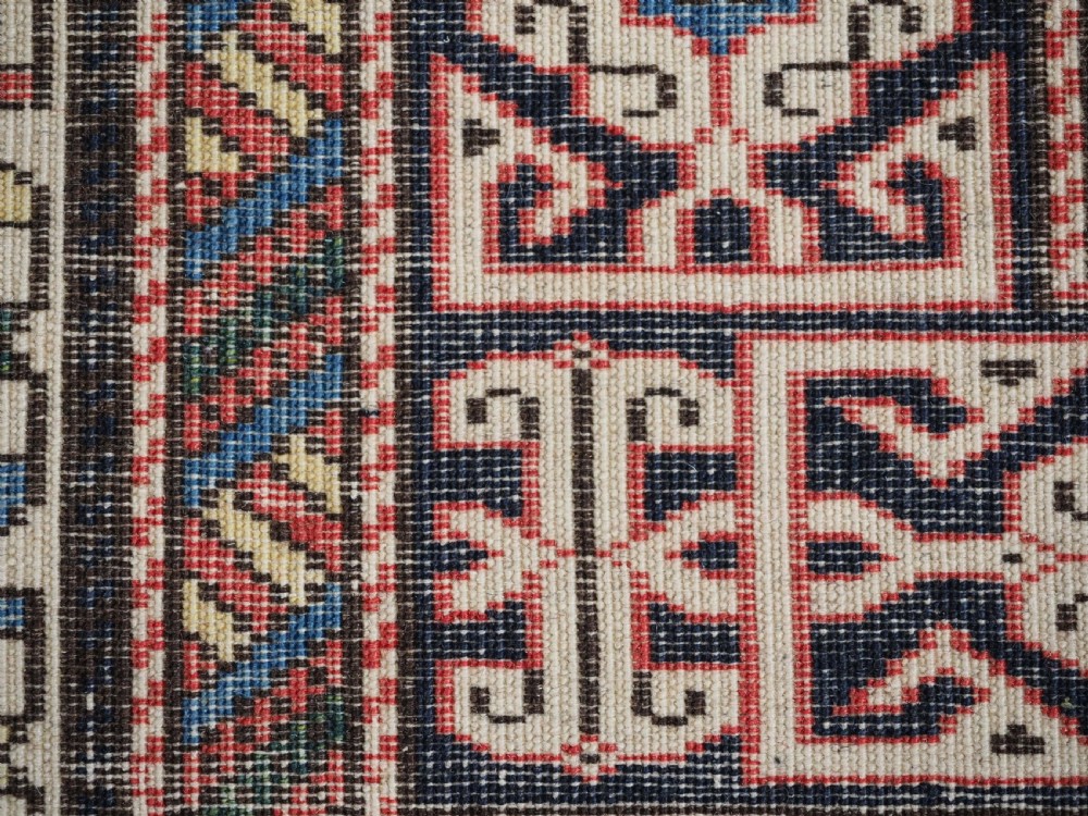 ANTIQUE CAUCASIAN KUBA PEREPEDIL RUG WITH SOFT RED GROUND, CIRCA 1900. View XIV
