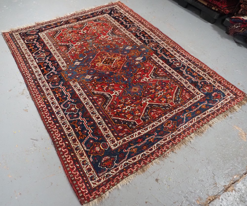 ANTIQUE KHAMSEH TRIBAL RUG, INTERESTING MEDALLION DESIGN, CIRCA 1900. View III