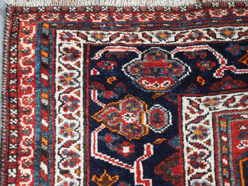 ANTIQUE KHAMSEH TRIBAL RUG, INTERESTING MEDALLION DESIGN, CIRCA 1900. View VI