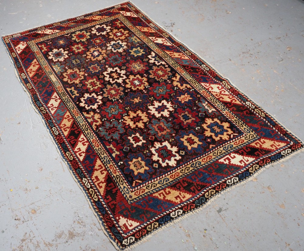 ANTIQUE CAUCASIAN DAGESTAN RUG WITH BLOSSOM DESIGN, CIRCA 1880. View II