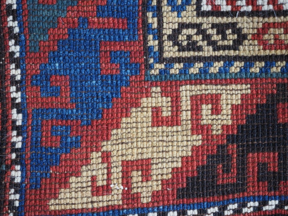 ANTIQUE CAUCASIAN DAGESTAN RUG WITH BLOSSOM DESIGN, CIRCA 1880. View XII
