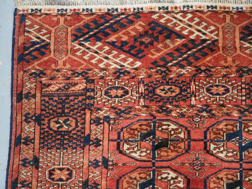ANTIQUE TEKKE TURKMEN 'DIP KHALI' RUG, SOFT WARM RED COLOUR, CIRCA 1900. View VI