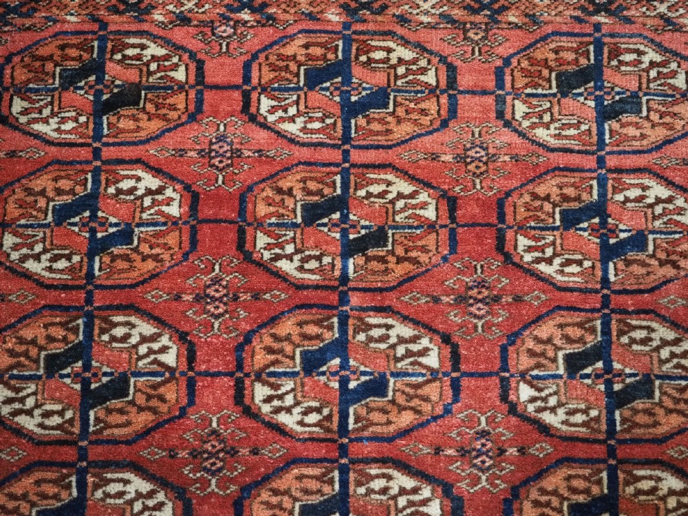 ANTIQUE TEKKE TURKMEN 'DIP KHALI' RUG, SOFT WARM RED COLOUR, CIRCA 1900. View VIII