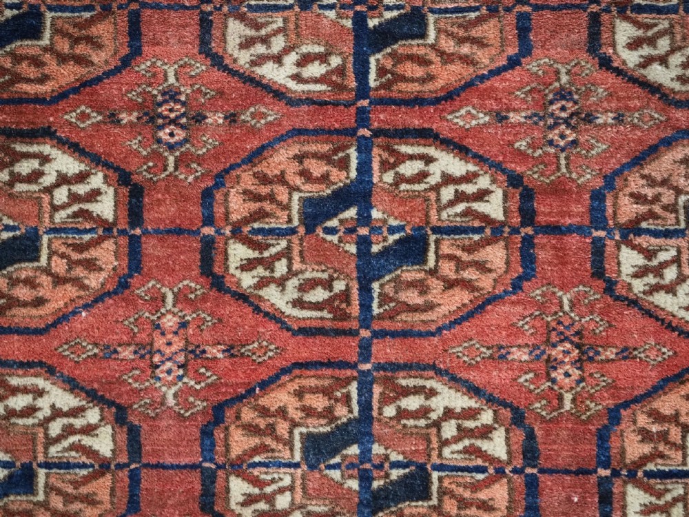 ANTIQUE TEKKE TURKMEN 'DIP KHALI' RUG, SOFT WARM RED COLOUR, CIRCA 1900. View IX