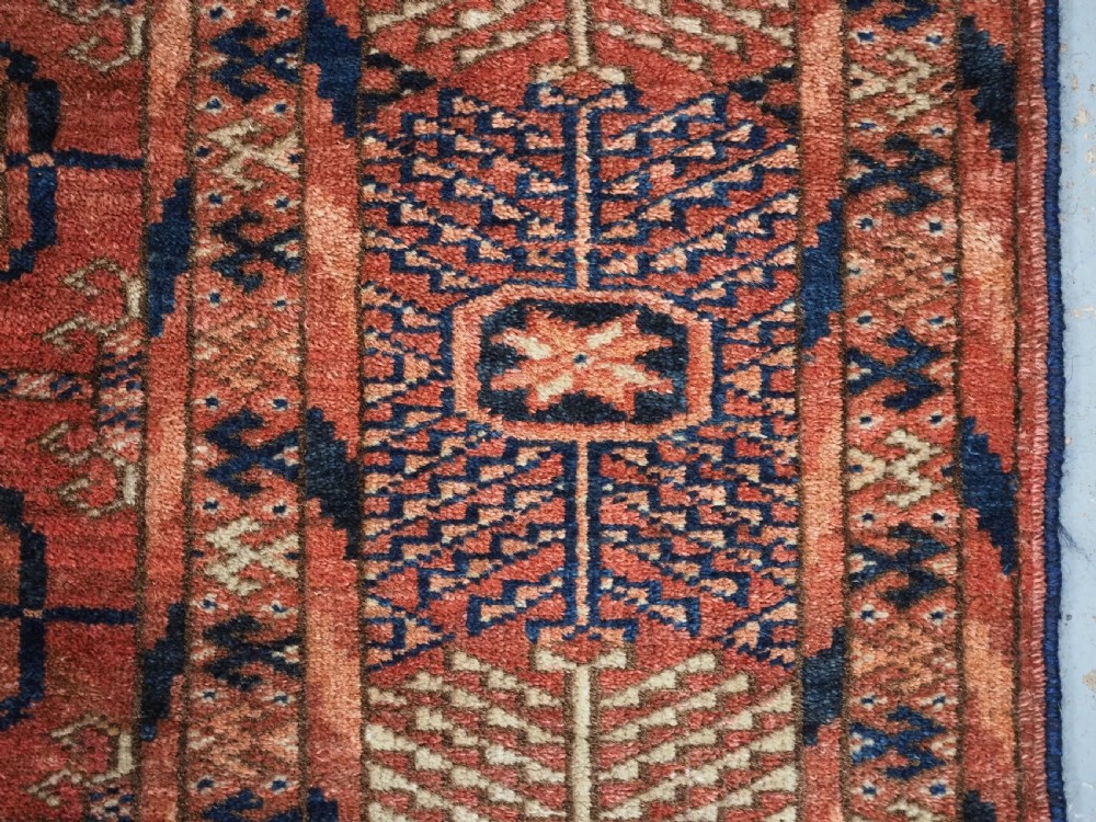 ANTIQUE TEKKE TURKMEN 'DIP KHALI' RUG, SOFT WARM RED COLOUR, CIRCA 1900. View XI