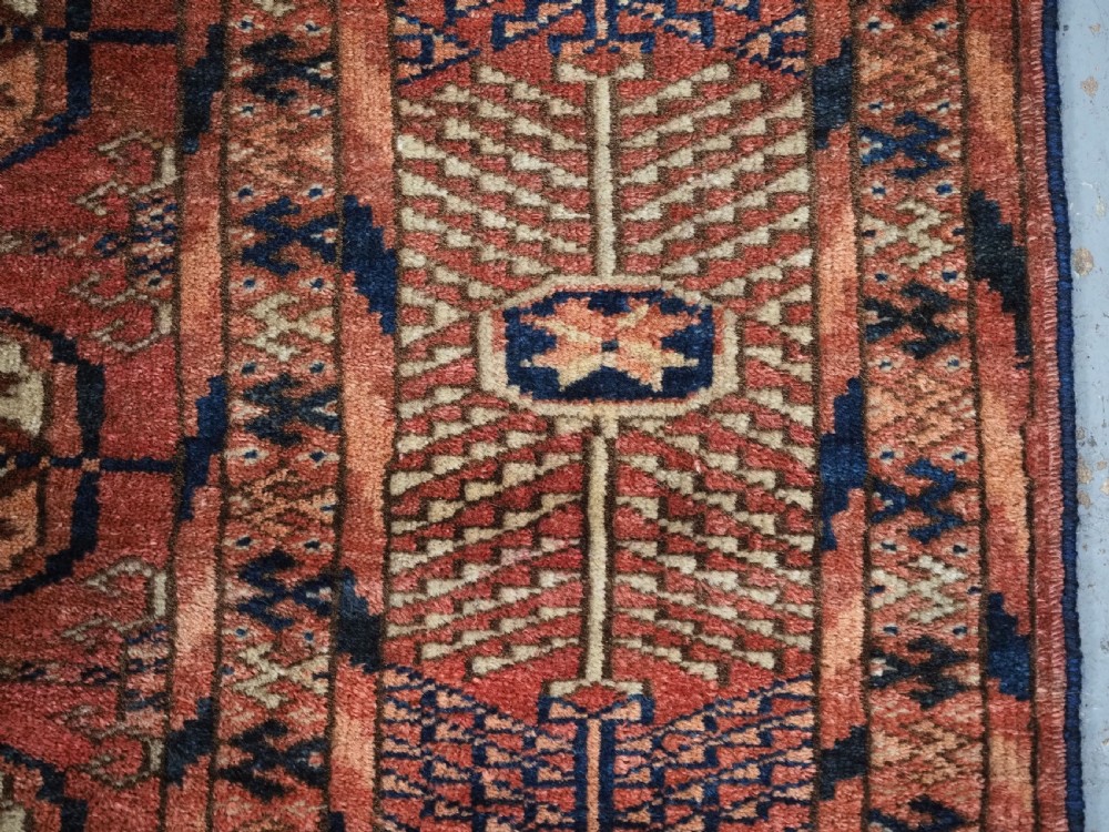 ANTIQUE TEKKE TURKMEN 'DIP KHALI' RUG, SOFT WARM RED COLOUR, CIRCA 1900. View XII