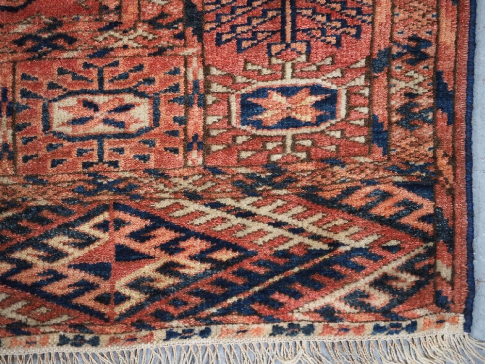 ANTIQUE TEKKE TURKMEN 'DIP KHALI' RUG, SOFT WARM RED COLOUR, CIRCA 1900. View XIII