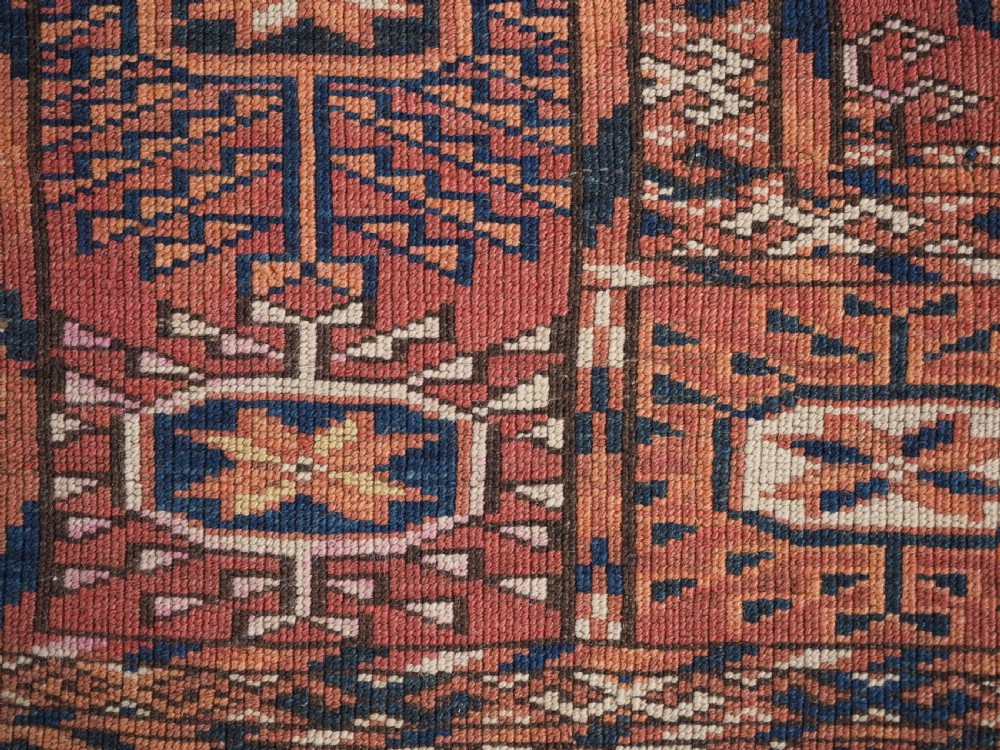 ANTIQUE TEKKE TURKMEN 'DIP KHALI' RUG, SOFT WARM RED COLOUR, CIRCA 1900. View XIV