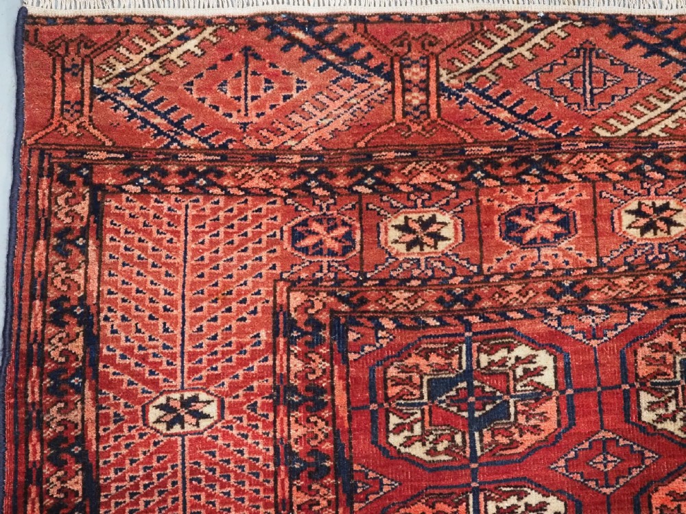 ANTIQUE TEKKE TURKMEN RUG WITH WARM RED COLOUR, CIRCA 1900. View VI
