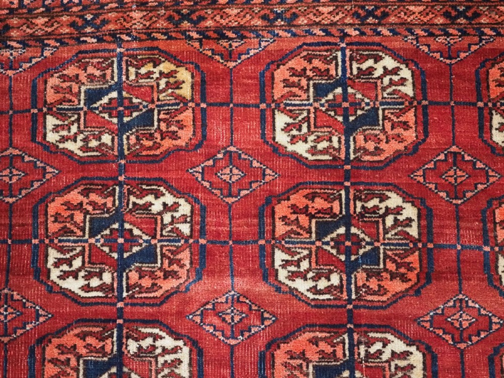 ANTIQUE TEKKE TURKMEN RUG WITH WARM RED COLOUR, CIRCA 1900. View VIII