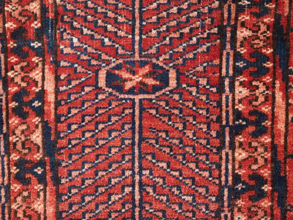 ANTIQUE TEKKE TURKMEN RUG WITH WARM RED COLOUR, CIRCA 1900. View XI