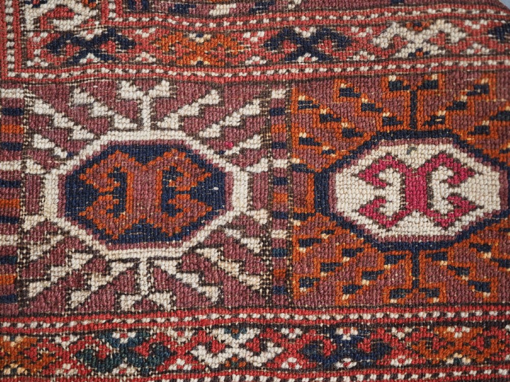 ANTIQUE TEKKE TURKMEN 'DIP KHALI' RUG WITH AUBERGINE FIELD COLOUR, CIRCA 1900. View XI