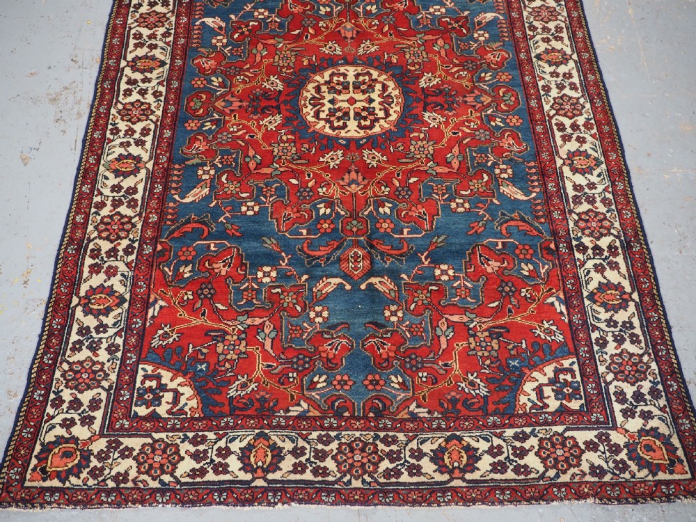 ANTIQUE TAFRESH VILLAGE RUG WITH SUPERB COLOUR, CIRCA 1920. View V