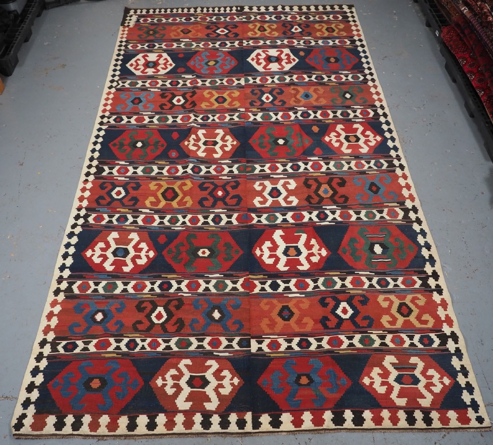 ANTIQUE CAUCASIAN SHIRVAN KILIM, WOVEN IN 2 PARTS, OLDER THAN MOST, CIRCA 1860/70.
