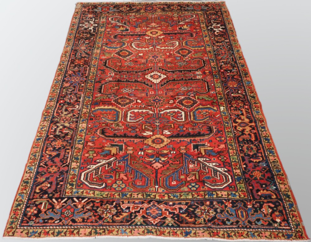 ANTIQUE HERIZ CARPET WITH ALL OVER DESIGN, SMALL ROOM SIZE, CIRCA 1910.