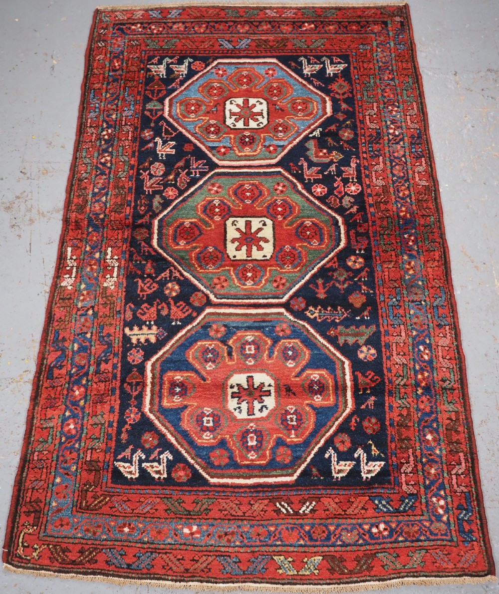 ANTIQUE KURDISH RUG OF OCTAGON DESIGN, SUPERB COLOUR & CONDITION, CIRCA 1900.