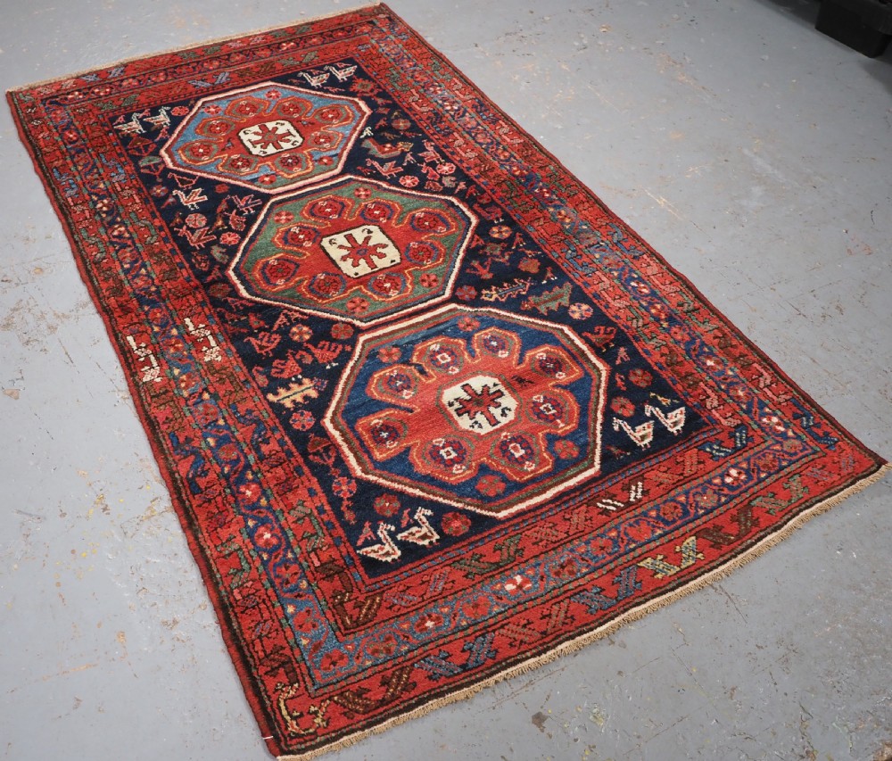 ANTIQUE KURDISH RUG OF OCTAGON DESIGN, SUPERB COLOUR & CONDITION, CIRCA 1900. View II
