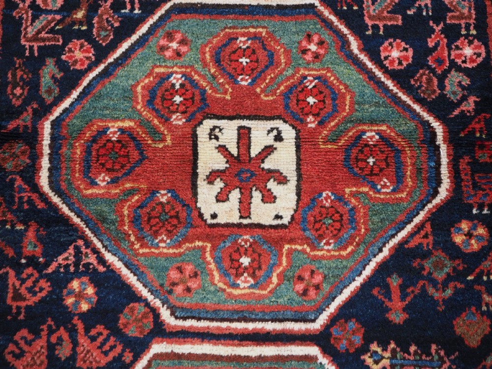 ANTIQUE KURDISH RUG OF OCTAGON DESIGN, SUPERB COLOUR & CONDITION, CIRCA 1900. View X