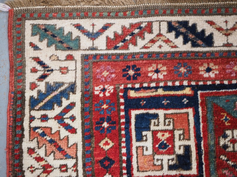 CAUCASIAN KAZAK RUG WITH STAR OF SCARCE SMALL SIZE, CIRCA 1890. View IV
