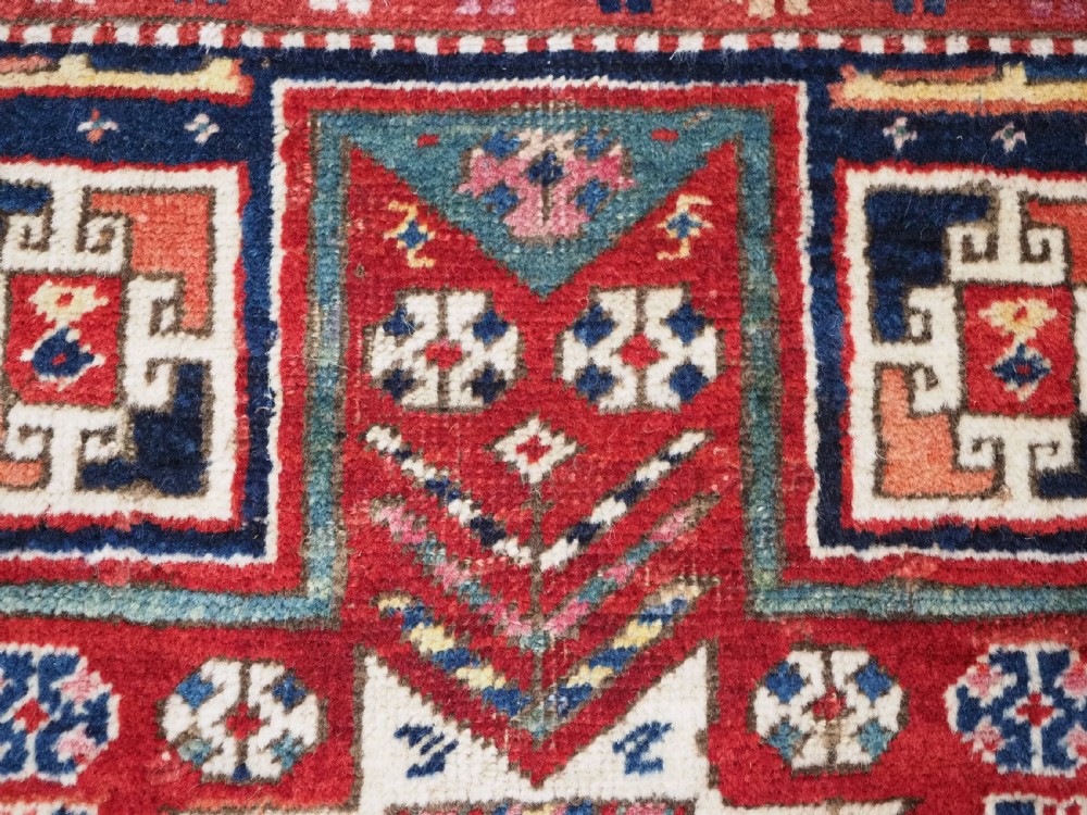 CAUCASIAN KAZAK RUG WITH STAR OF SCARCE SMALL SIZE, CIRCA 1890. View VII