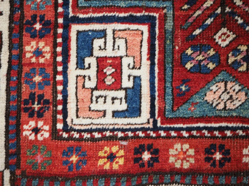 CAUCASIAN KAZAK RUG WITH STAR OF SCARCE SMALL SIZE, CIRCA 1890. View IX