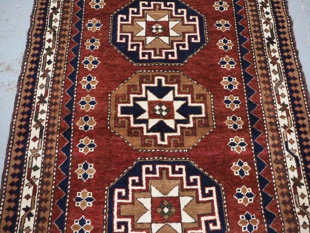 OLD TURKISH KAZAK RUG, KARS REGION, OCTAGON MEDALLION DESIGN, CIRCA 1920/30. View IV