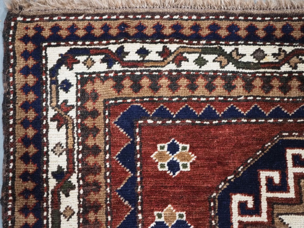 OLD TURKISH KAZAK RUG, KARS REGION, OCTAGON MEDALLION DESIGN, CIRCA 1920/30. View VI