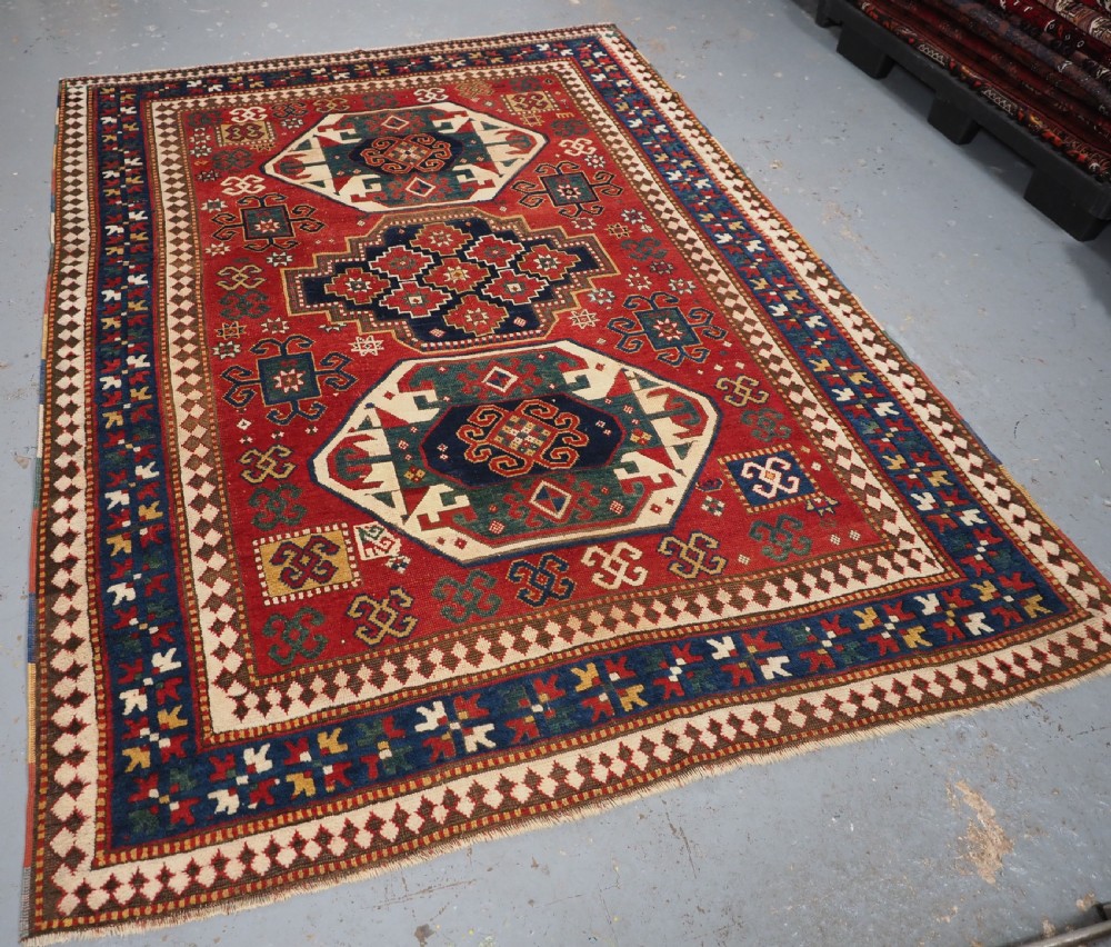 ANTIQUE CAUCASIAN TRIPLE MEDALLION KAZAK RUG, CLASSIC DESIGN, 2ND HALF 19TH CENTURY. View II