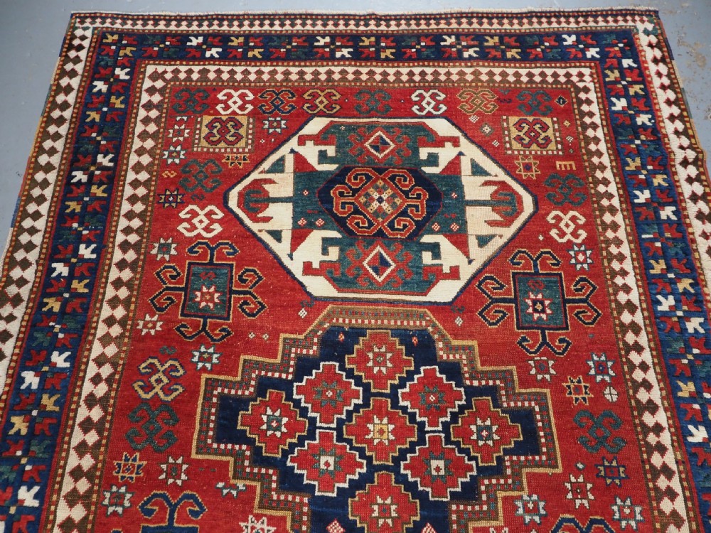 ANTIQUE CAUCASIAN TRIPLE MEDALLION KAZAK RUG, CLASSIC DESIGN, 2ND HALF 19TH CENTURY. View III