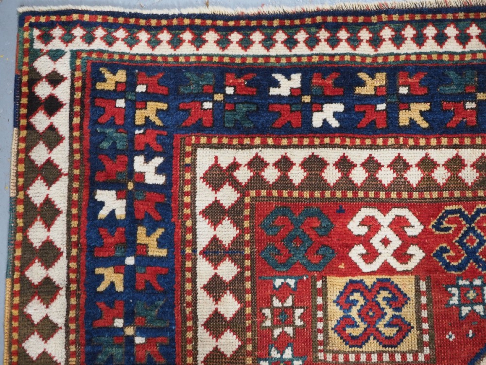 ANTIQUE CAUCASIAN TRIPLE MEDALLION KAZAK RUG, CLASSIC DESIGN, 2ND HALF 19TH CENTURY. View VI