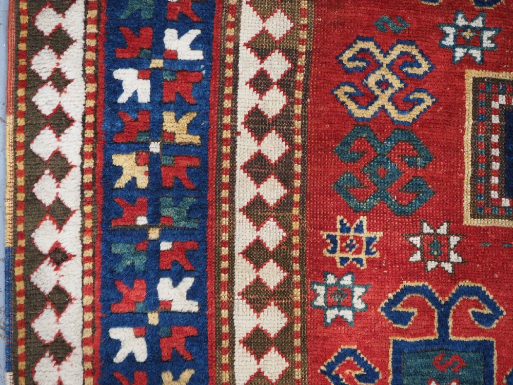ANTIQUE CAUCASIAN TRIPLE MEDALLION KAZAK RUG, CLASSIC DESIGN, 2ND HALF 19TH CENTURY. View VII