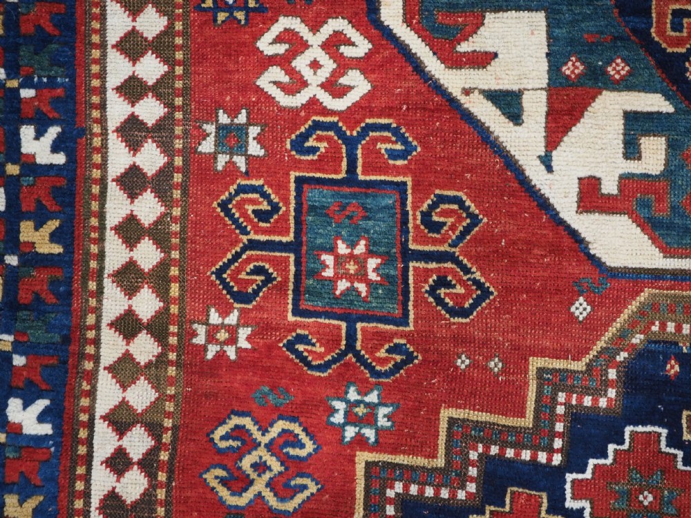 ANTIQUE CAUCASIAN TRIPLE MEDALLION KAZAK RUG, CLASSIC DESIGN, 2ND HALF 19TH CENTURY. View X