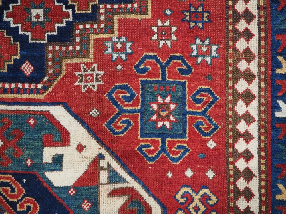 ANTIQUE CAUCASIAN TRIPLE MEDALLION KAZAK RUG, CLASSIC DESIGN, 2ND HALF 19TH CENTURY. View XII