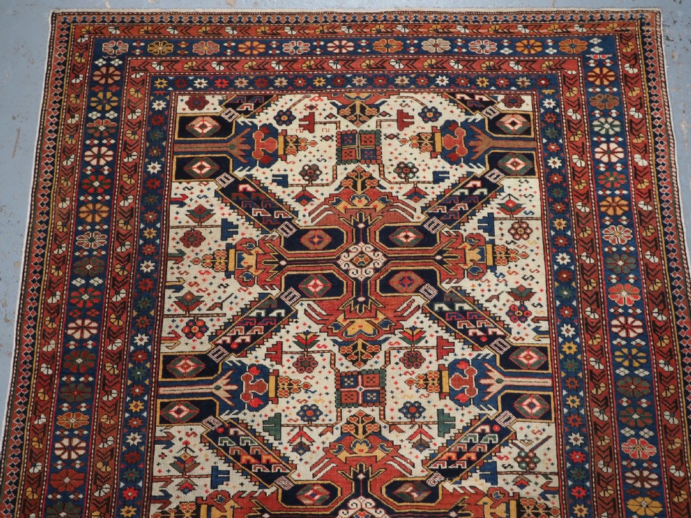 ANTIQUE CAUCASIAN SEICHUR RUG OF CLASSIC CROSS DESIGN, CIRCA 1880. View III