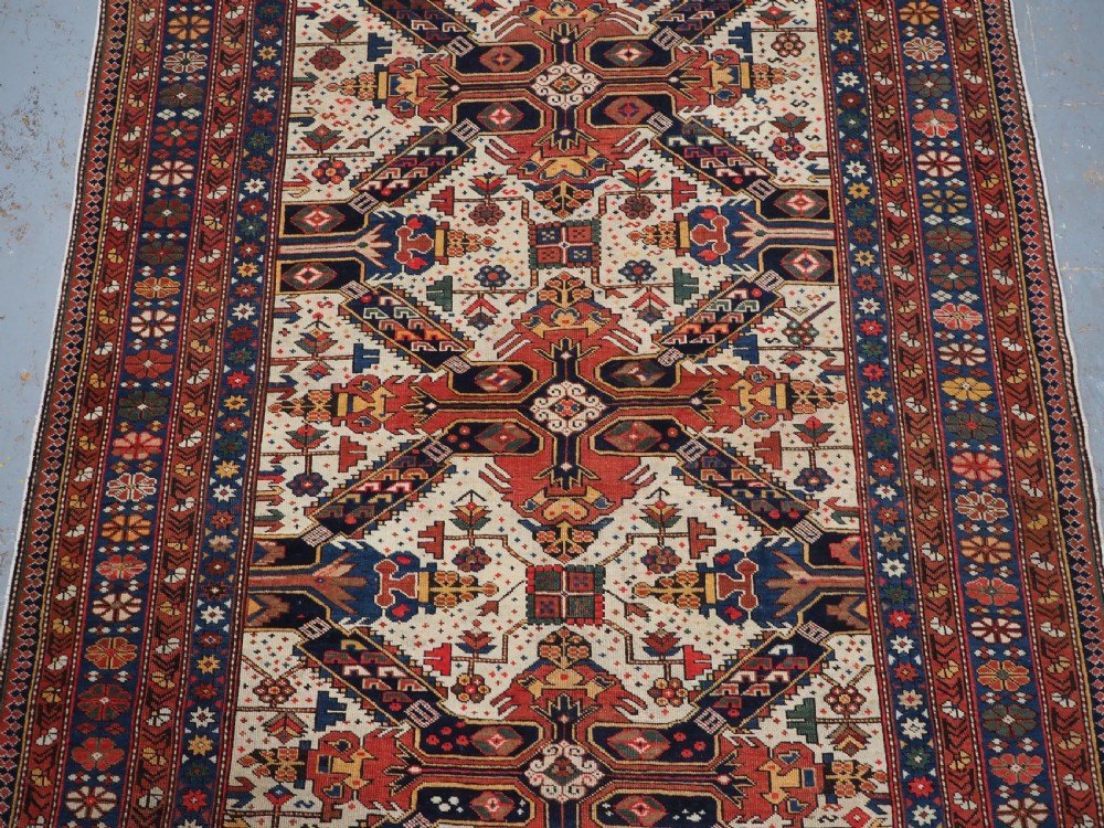 ANTIQUE CAUCASIAN SEICHUR RUG OF CLASSIC CROSS DESIGN, CIRCA 1880. View IV