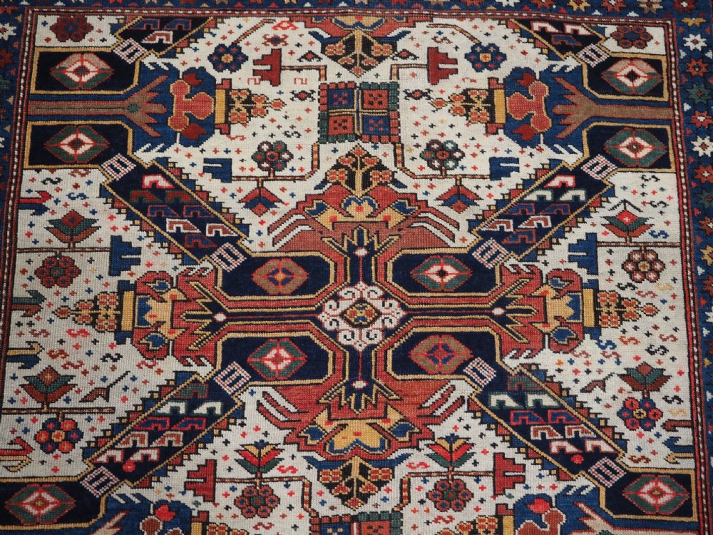 ANTIQUE CAUCASIAN SEICHUR RUG OF CLASSIC CROSS DESIGN, CIRCA 1880. View VIII