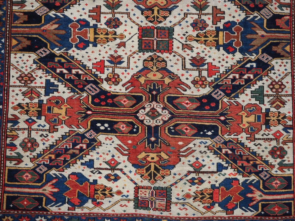 ANTIQUE CAUCASIAN SEICHUR RUG OF CLASSIC CROSS DESIGN, CIRCA 1880. View XI