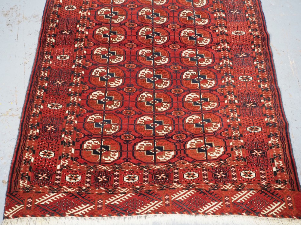 ANTIQUE TEKKE TURKMEN DIP KHALI RUG, GOOD COLOUR & CONDITION, CIRCA 1900. View V