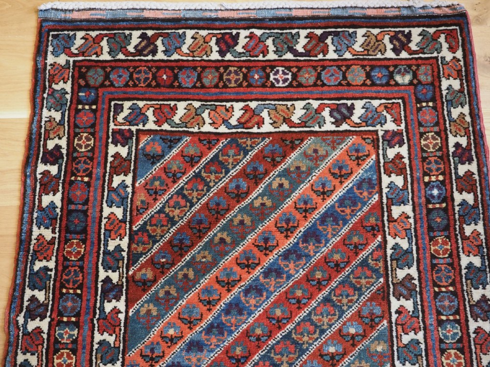 OLD KURDISH RUG WITH DIAGONAL STRIPE DESIGN, SOUTHERN CAUCAUS, CIRCA 1930. View III