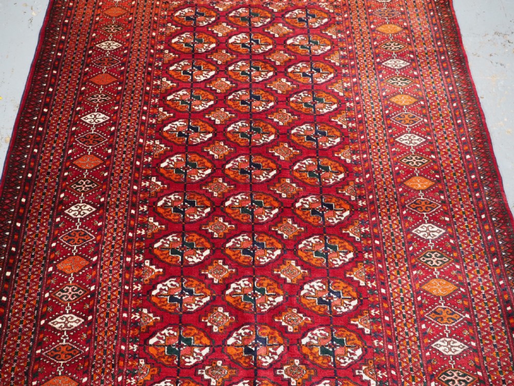 OLD TEKKE TURKMEN RUG, ROWS OF SMALL ANIMALS, CIRCA 1920/30. View V