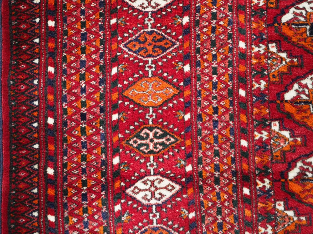 OLD TEKKE TURKMEN RUG, ROWS OF SMALL ANIMALS, CIRCA 1920/30. View VII