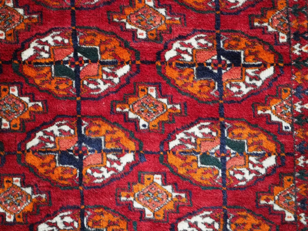 OLD TEKKE TURKMEN RUG, ROWS OF SMALL ANIMALS, CIRCA 1920/30. View IX