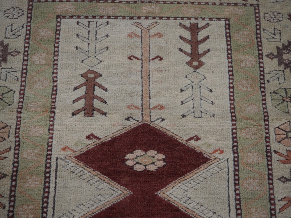 OLD TURKISH MILAS PRAYER RUG OF TRADITIONAL DESIGN, CIRCA 1920/30. View VIII